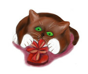 Brown Tuxedo Kitten Attacks a Heart Shaped Box of Chocolates